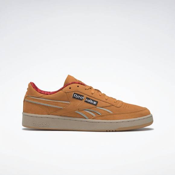 NEW REEBOK unisex jurassic park club c sneakers in rich ochre / diffused blue / - Picture 1 of 10